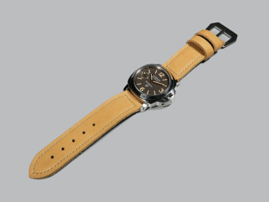 Tan wristband complementing Panerai watch IMAGE