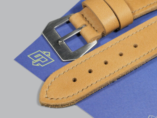 Panerai wristwatch with tan strap IMAGE